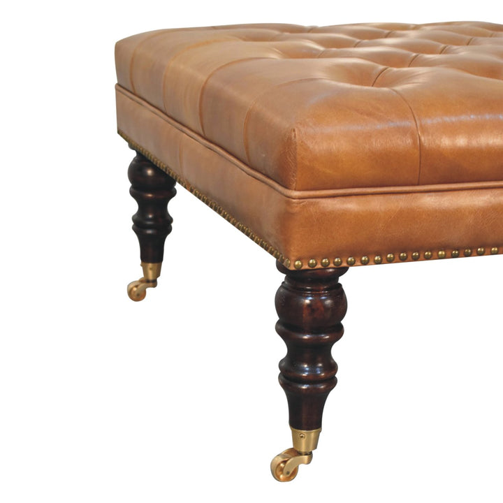 Solid Wood Studded Buffalo Leather Upholstered Ottoman with Castor Legs, Tan and Brown
