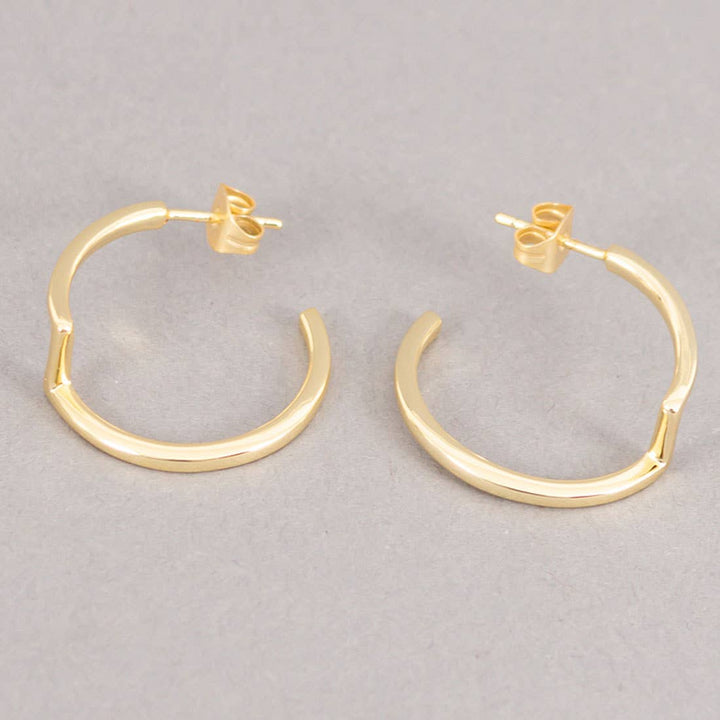 Era Stud Earrings / Gold - Brass / L-1W-0.90 Inches (L X W) / Moq - 4 Pairs